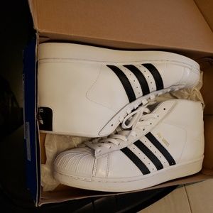 Men size 12 black and white Adidas